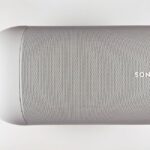 Top view of a sleek wireless speaker with a minimalistic design.