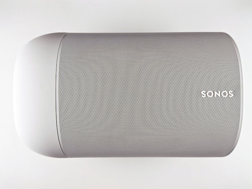 Top view of a sleek wireless speaker with a minimalistic design.